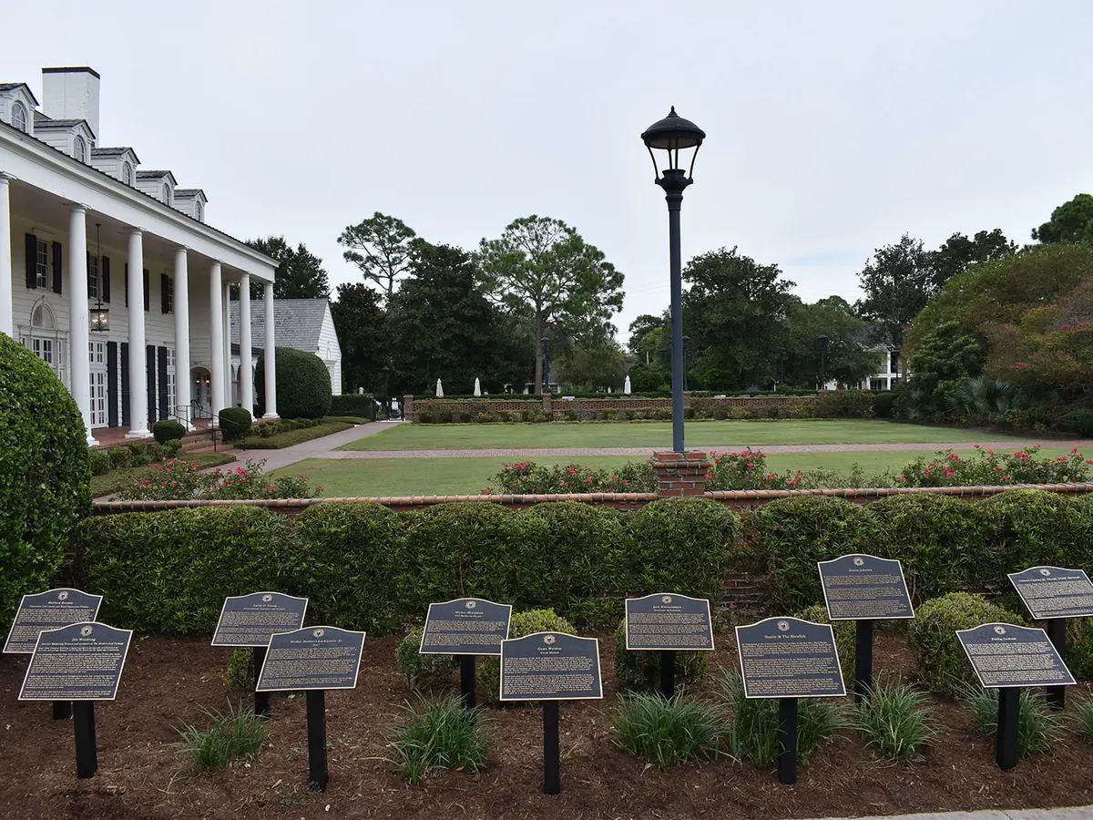 Bronze plaques honoring each inductee in the Hall of Fame garden at Pine Lakes