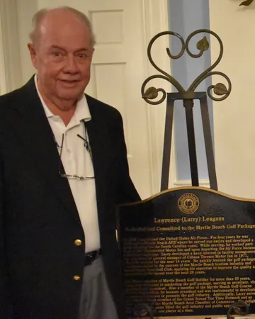 Larry Leagans with his Hall of Fame plaque.