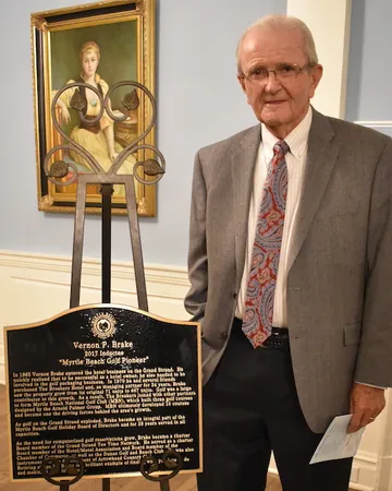 Vernon Brake with his Hall of Fame plaque.